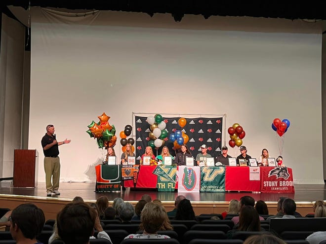 Nine student-athletes were recognized at Vero Beach High School after signing on National Signing Day last week; from left-to-right; Ava Baysura (Miami, cross country/track and field), Katy Dalton (Mercer, beach volleyball), Katherine Earnest (Ferris State, tennis), Kerrigan Gilmore (USF, lacrosse), Madison Gravlee (Florida, volleyball), James Hassell (USF, golf), Jackson Hiller (Oglethorpe, golf), Blake Holshouser (Erskine, baseball) and Alexa Vega (Stony Brook, lacrosse).