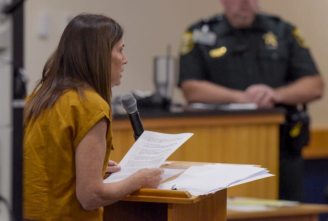 Cindy Mishcon, sister of murder victim Michelle Mishcon, reads her statement about killer Austin Harrouff during a court proceeding before Circuit Judge Sherwood Bauer at the Martin County Courthouse on Monday, Nov. 28, 2022 in Stuart.