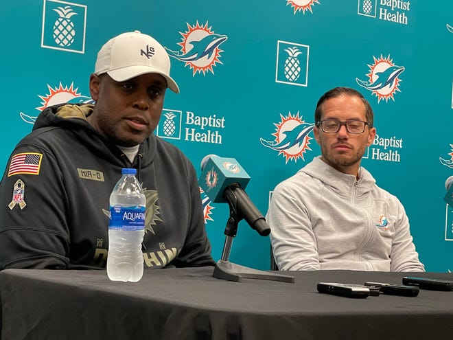 Dolphins general manager Chris Grier and coach Mike McDaniel address reporters.