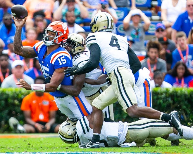 Florida quarterback Anthony Richardson tries to get off a pass under pressure during last week's loss to Vanderbilt.