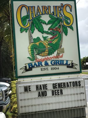 The sign in front of Charlie's Neighborhood Bar & Grill in Stuart.