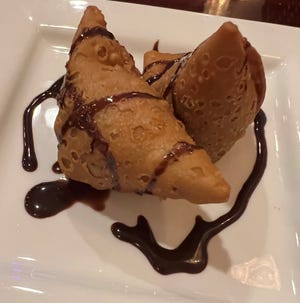 The Chocolate Samosa was a decadent fried pastry stuffed with dark chocolate and cashew.