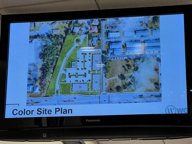 Site plans for a proposed 90-unit apartment development on the northwest corner of Palm City School Avenue and Southwest Martin Highway are shown during an Old Palm City Neighborhood Advisory Committee meeting on Aug. 15, 2022.