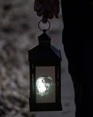 Larry Lawson, a paranormal investigator and owner of Indian River Hauntings, leads a group through the "Vero Beach Beachside Historical Ghost Walk" along Ocean Drive Wednesday, Sept. 22, 2021, in Vero Beach. Lawson's tours give guests the opportunity to participate in a paranormal adventure combined with historical facts and haunted stories.