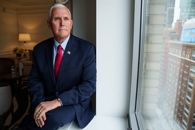 Former Vice President Mike Pence poses for a portrait during an interview. Pence released a new autobiography "So Help Me God" that chronicles his life and including his time in the Trump administration.