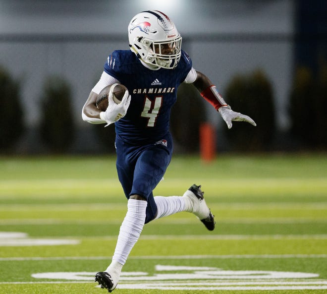 Chaminade-Madonna's Edwin Joseph (4) sprints down the field. Chaminade-Madonna leads Berkeley Prep 7-0 at the half of the 3A State Championship game at Gene Cox Stadium on Friday, Dec. 10, 2021.