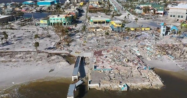 In the Know: Fort Myers Beach damage after Hurricane Ian's devastation. Times Square was in the center. Holiday Court villas had been at the top left of the image, north of the two yellow and green buildings. Clipped and edited from USA TODAY Network video footage.
