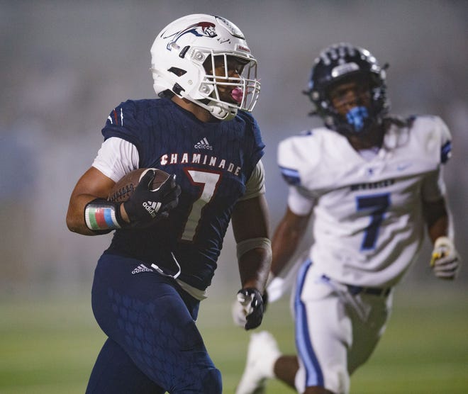 Chaminade-Madonna's Davion Gause (7) runs the ball down the field. Chaminade-Madonna shutout Berkeley Prep 21-0 to claim the 3A State Championship title at Gene Cox Stadium on Friday, Dec. 10, 2021.