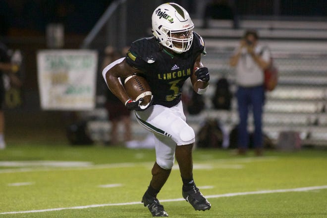 Lincoln senior Raylen Wilson (3) returns a punt in a game against Florida High on Nov. 3, 2022, at Gene Cox Stadium. The Seminoles won, 10-9.