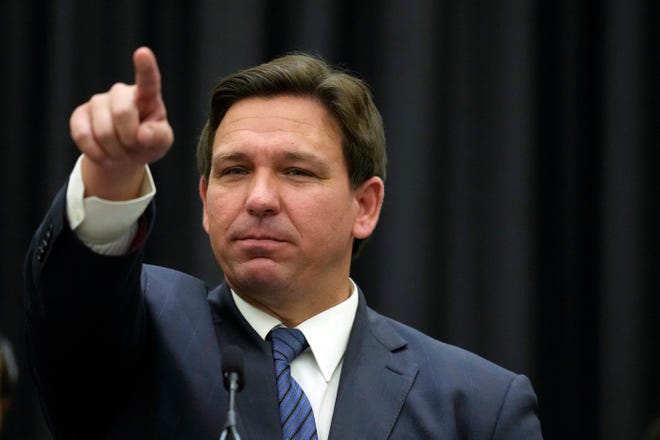 Florida Gov. Ron DeSantis calls on a journalist during a press conference, Thursday, Sept. 22, 2022, in Miami. DeSantis held a press conference in Fort Lauderdale Thursday to sign legislation cutting tolls for frequent toll road users and was asked about abortion and gun legislation. (AP Photo/Rebecca Blackwell)