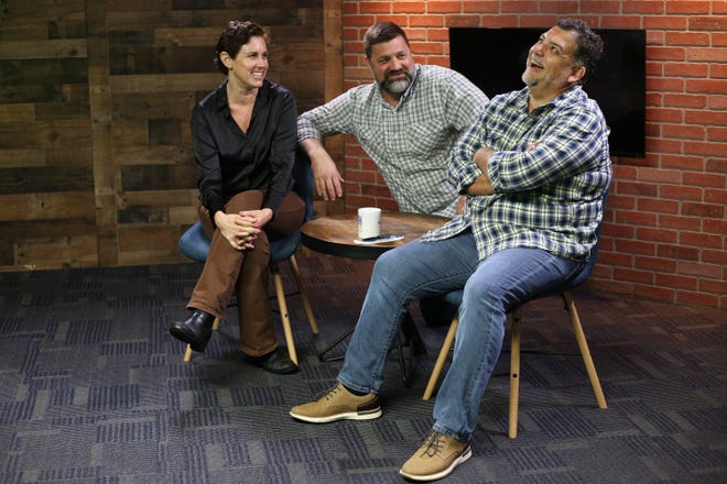 Photographer Tina Aligata, Creative Director Bryan Smith and radio personality Daniel Russo, share a laugh in 8th Avenue Studios in Port St. Lucie on Monday, Nov. 21, 2022. Russo, a local radio personality, is hosting the "Don't Come Here" podcast for the Treasure Coast.