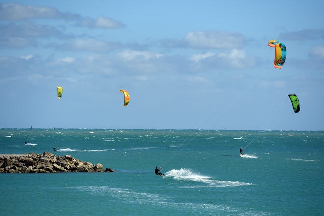 When the weather conditions are just right, kite surfers will gather at the beach just south of the Fort Pierce Inlet.