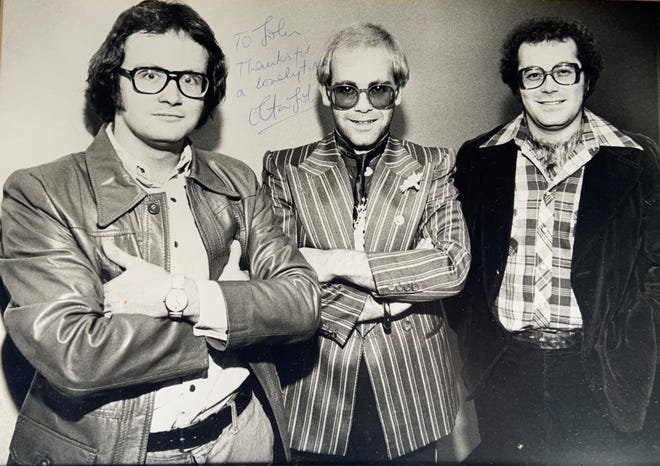 Former Sunrise Theatre Director John Wilkes (left) seen with Elton John.