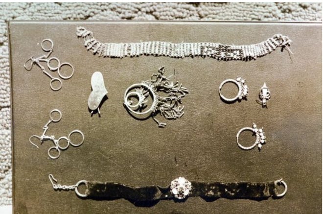 This evidence photo shows jewelry in possession of convicted killer Gerard Schaefer, a one-time Martin County Sheriff's Office deputy convicted in the savage 1972 slaying of two teenage girls. Implicated in up to 30 more deaths, Schaefer was killed in prison by a fellow inmate in 1995.