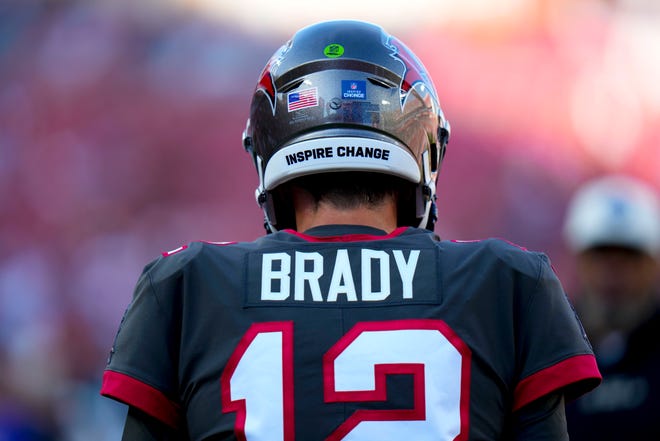 Tampa Bay Buccaneers quarterback Tom Brady (12) warms up before an NFL football game between the Tampa Bay Buccaneers and the Cincinnati Bengals, Sunday, Dec. 18, 2022, in Tampa, Fla. (AP Photo/Chris O'Meara)