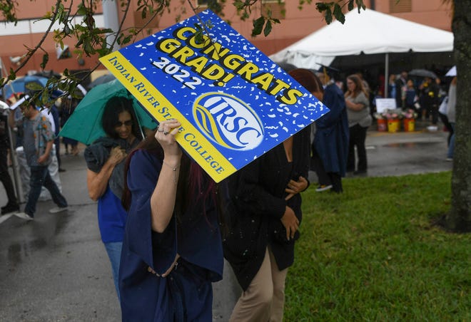 Faculty and students celebrate together during the Indian River State College Fall 2022 Commencement ceremony at the Havert L. Fenn Center on Wednesday, Dec. 14, 2022, in Fort Pierce.