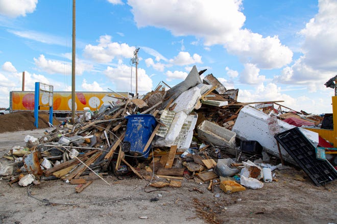 Debris from Island Seafood Market on Matlacha are seen on Tuesday, Oct. 11, 2022. “This is where people of Southwest Florida, Cape Coral, Fort Myers and the surrounding areas come to get access to fish and crabs off boats,” Casey Streeter said adding that they can’t lose the history of the island. “We're at ground zero right now, for the storm and for what a rebuild looks like for all of our working waterfronts moving forward.”