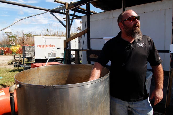 Dallas Ryan shows where they use a steamer boiler to prepare the stone crab before distribution at the Island Crab Company on Tuesday, Oct. 11, 2022. Ryan, a manager at Island Crab Company in St. James City on Pine Island, says the stone crab season should be good. “We pray that it’ll be good because there are a lot of people that depend on this industry,” Ryan said. “If you can’t get your gear in the water, you can’t make money. As a supplier, that’s his biggest concern. We’ve got to get the crabs in here so we can distribute them to everybody else.”