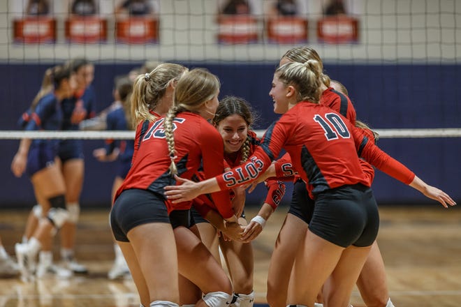 Athletes celebrate during the Florida High School Athletic Association Class 3A girls' volleyball action at The Benjamin School in in Palm Beach Gardens, Fla., on September 6, 2022.