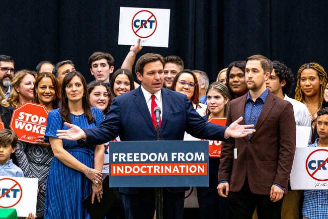 Florida Gov. Ron DeSantis signs his "Stop Woke" bill in Hialeah Gardens on April 22, 2022. He is expected to keep driving policy proposals over the next few months that he can tout in a potential presidential campaign.
(Photo: Daniel A. Varela/AP)