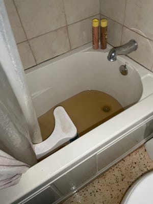 During Hurricane Ian, sewage backed up in Heather Middleton Isaacs Orlando home.