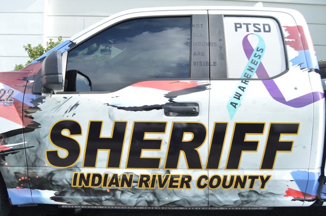 A Indian River County Sheriff's Office patrol truck with a graphic wrap promoting a "PTSD Awareness" message and names of local resources for first responders and military veterans was unveiled by the agency Nov. 1, 2022, according to the agency.