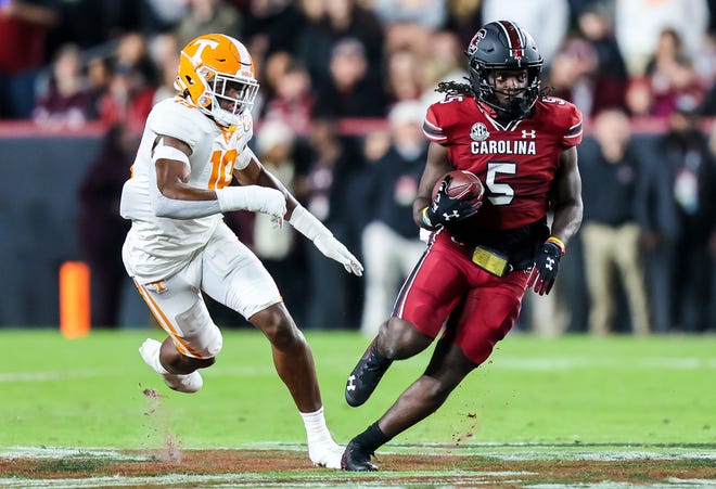 South Carolina's Dakereon Joyner (5) runs for yardage against Tennessee during the Gamecocks' 63-38 victory on Nov. 19.