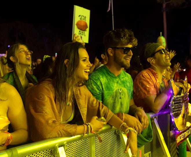 Festivalgoers enter the portal for the fifth year of the Okeechobee Music & Arts Festival on Friday, March 4, 2022, at Sunshine Grove in Okeechobee County. The festival, a four day music, arts, wellness and camping experience that debuted in 2016, returned after 2021’s event was canceled because of the coronavirus pandemic. Friday’s performers included Tame Impala, Gary Clark Jr., Pepper, Duckwrth and more.