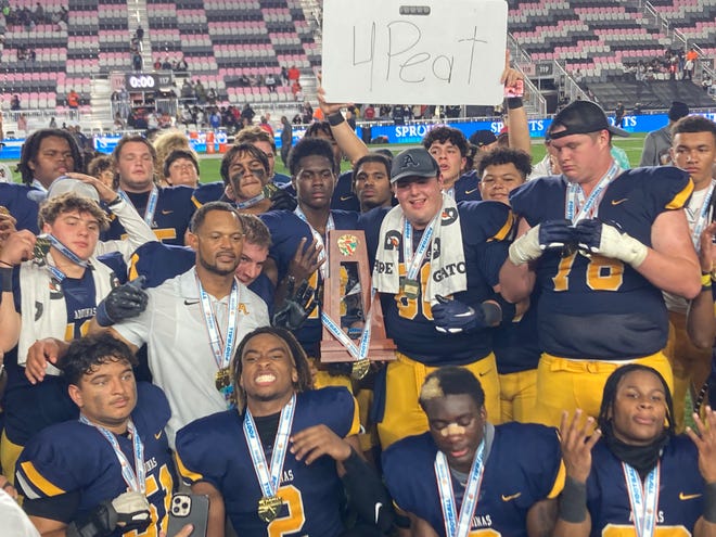 St. Thomas Aquinas celebrates its 38-21 win against Homestead in the Class 3M state championship Thursday at DRV PNK Stadium in Fort Lauderdale.