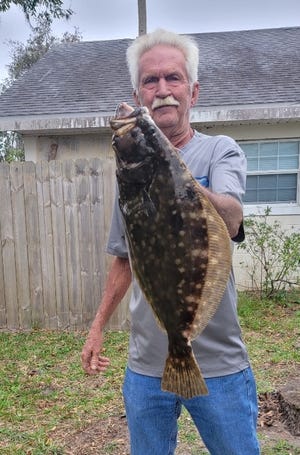Local angler Barry Beamer with a nice-sized flounder.