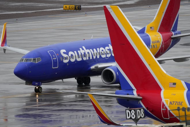 A Southwest Airlines jet arrives at Sky Harbor International Airport, Wednesday, Dec. 28, 2022, in Phoenix. Travelers who counted on Southwest Airlines to get them home suffered another wave of canceled flights Wednesday, and pressure grew on the federal government to help customers get reimbursed for unexpected expenses they incurred because of the airline’s meltdown.