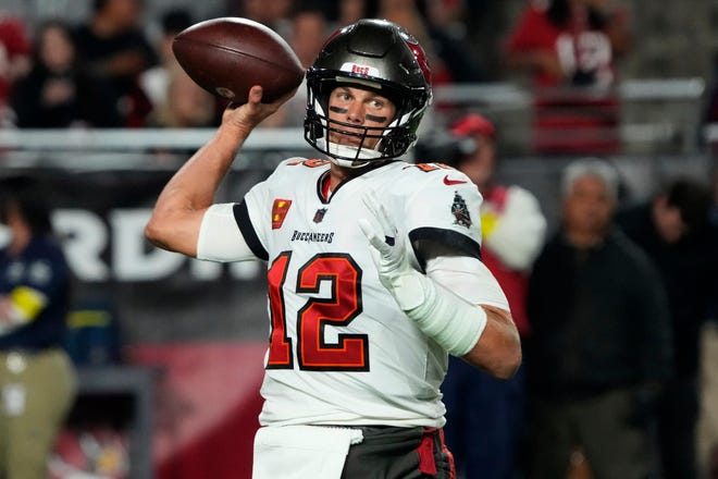 Tampa Bay Buccaneers quarterback Tom Brady (12) throws against the Arizona Cardinals during the second half of an NFL football game, Sunday, Dec. 25, 2022, in Glendale, Ariz. (AP Photo/Rick Scuteri)