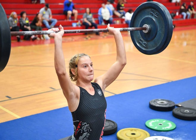 South Fork sophmore Paisley Bergen competes in the clean and jerk weightlifting competition during the girls District 15-2A championship, Wednesday, Jan. 25, 2023, at South Fork High School in Martin County.