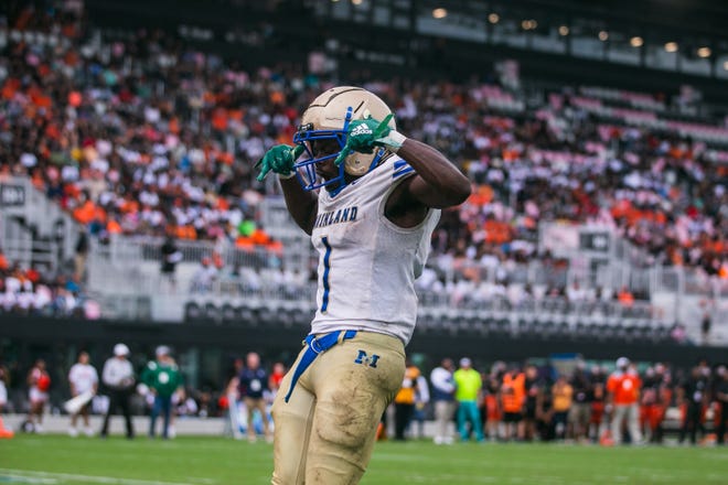 Mainland running back Ajai Harrell (1) celebrates a touchdown in the fourth quarter during the second half of the Class 3S football state championship game between Lake Wales and Mainland at DRV PNK Stadium on Friday, December 16, 2022, in Fort Lauderdale, FL. Final score, Lake Wales, 32, Mainland, 30.