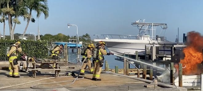 Martin County firefighters extinguished a boat fire on a dock in Port Salerno around 9 a.m. Thursday, February 2, 2023.