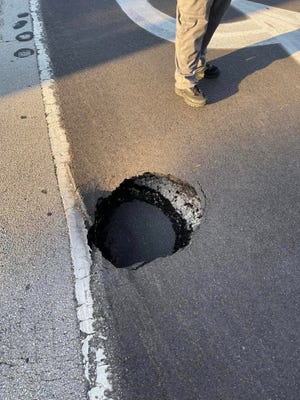 What was described as a "sinkhole" opened up on Kanner Highway in Stuart on Feb. 22, 2023.