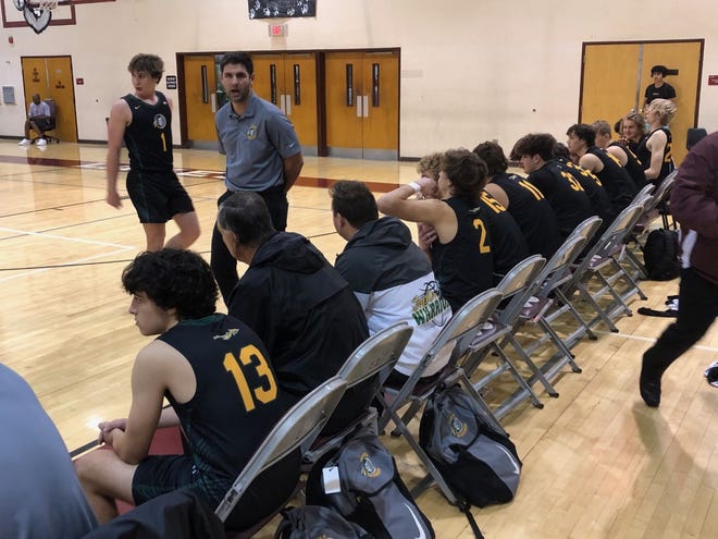 Jupiter coach J.D. DePasquale gives instructions to his team during Wednesday night's 46-42 loss to Centennial at Palm Beach Lakes High.