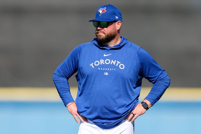 Blue Jays manager John Schneider keeps a close eye on spring training workouts at the team's player development complex in Dunedin, Fla.