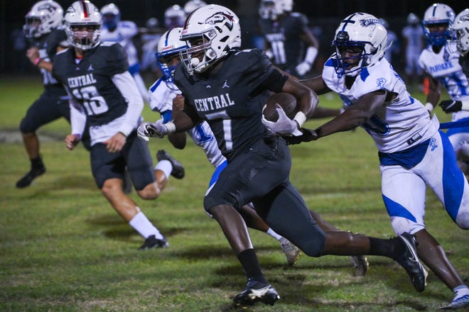 Palm Beach Central wide receiver Javorian Wimberly (7) runs the ball down the field by being chased by Pahokee's Torian Henley (20) during the football game between Pahokee and host Palm Beach Central on Friday, September 16, 2022, in Wellington, FL. Final score, Pahokee, 34, Palm Beach Central, 14.