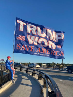 A Trump supporter on Jan. 6, 2023, along Southern Boulevard.