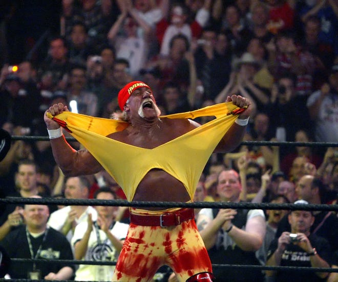 Hulk Hogan fires up the crowd between matches during WrestleMania 21 at the Staples Center in Los Angeles in 2005.