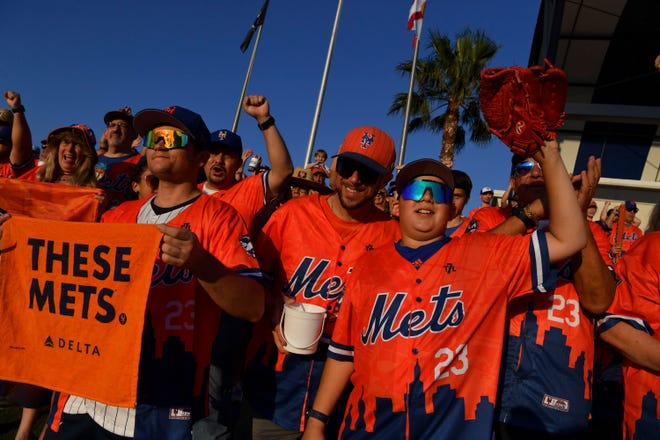 About 1,000 die-hard New York Mets' fans referred to as the 7 Line Army, packed Clover Park stadium for the spring training season home opener against the Miami Marlins on Saturday, Feb. 25, 2023, in Port St. Lucie. The Mets played split squad games Saturday. The other half of the team played the Houston Astros in West Palm Beach.