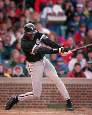 Chicago White Sox Michael Jordan follows through on his sixth-inning RBI double against the Chicago Cubs April 7, 1994 in Chicago.