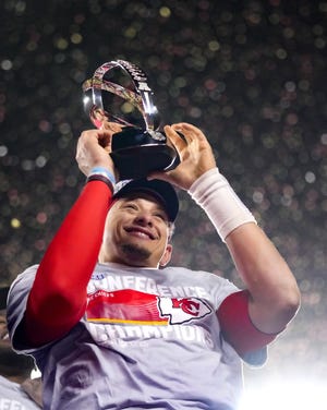 Kansas City Chiefs quarterback Patrick Mahomes celebrates after the NFL AFC Championship playoff football game against the Cincinnati Bengals, Sunday, Jan. 29, 2023, in Kansas City, Mo. The Chiefs won 23-20. (AP Photo/Charlie Riedel)