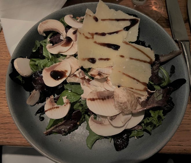The Mushroom Salad was crisp, cool fresh greens, toasted pine nuts, earthy shaved mushrooms, parmesan cheese, and a balsamic vinaigrette.