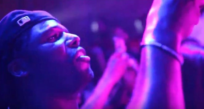 This image taking from video provided by Raheem McCaskill/16ShotEm Visualz shows Zachary Stoner at the Refuge music club in Chicago on May 29, 2018. Chicago police documents obtained by The Associated Press show investigators believe they solved the 2018 killing of a gangland journalist known as “ZackTV” but that prosecutors declined to prosecute. Police never announced arrests in the downtown shooting of Zachary Stoner.