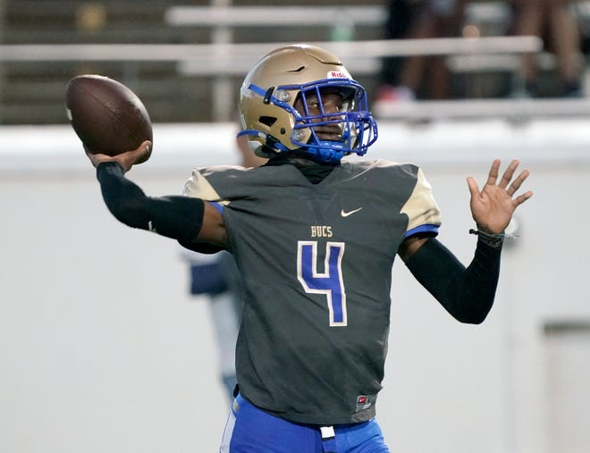 Mainland QB Demarcus Creecy (4) looks to pass during a game with Flagler Palm Coast at Daytona Stadium in Daytona Beach, Monday, Sept.19, 2022.