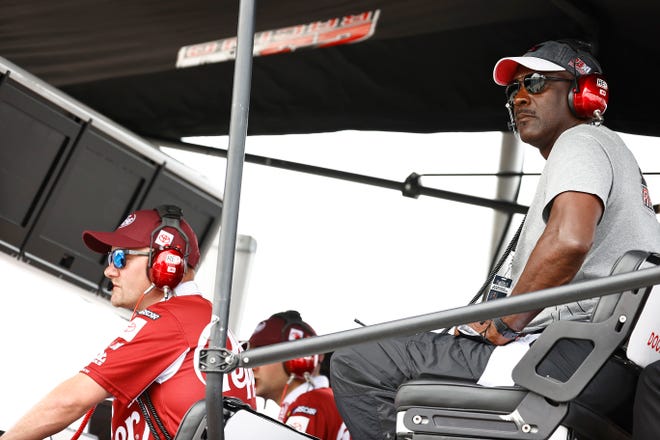 NBA Hall of Famer Michael Jordan and co-owner of 23XI Racing looks on from the 23XI Racing pit box during the NASCAR Cup Series Go Bowling at The Glen at Watkins Glen International on August 08, 2021 in Watkins Glen, New York.