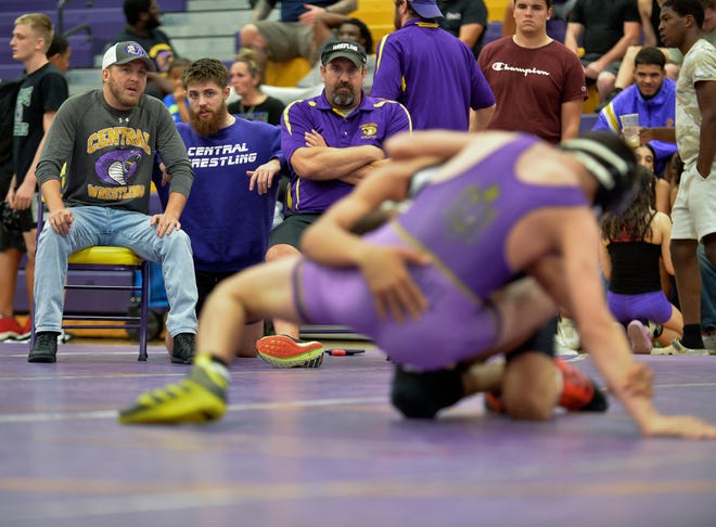 High school wrestling action during the FLSAA Class 3A District 10 Championship Boys Wrestling at Fort Pierce Central gym on Friday, Feb. 17, 2023, in Fort Pierce.