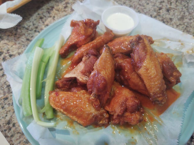 We enjoyed the self-proclaimed Nick’s ‘Delicious’ sauce coating the award-winning wings.  Other sauces are also available.
